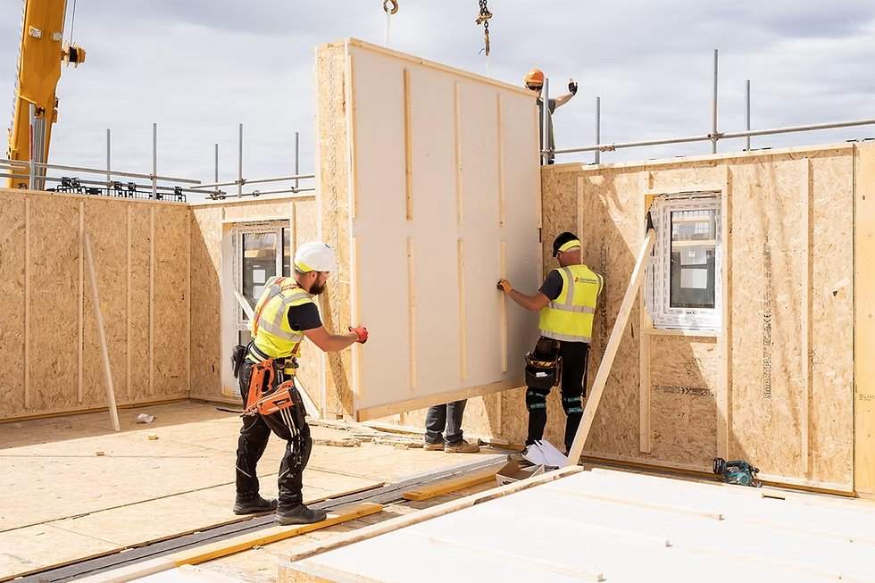 Timber panels being installed on site